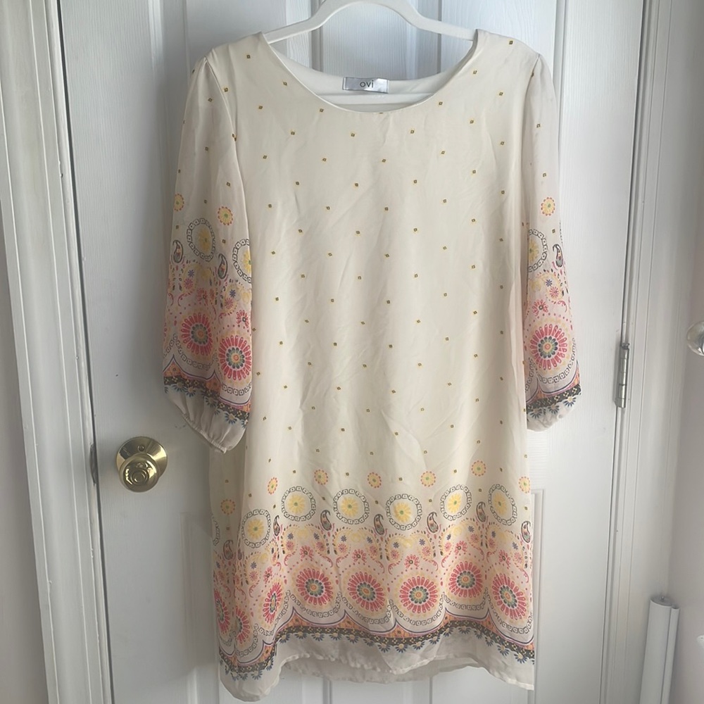 Ovi cream and floral dress